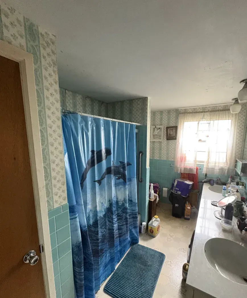 Bathroom of a Northglenn, Colorado house bought as-is by Windcrest Investments, before