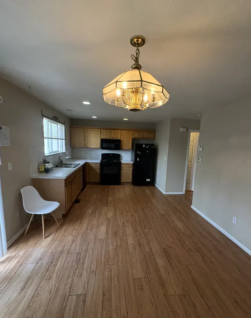 Kitchen of a Thornton, Colorado house bought as-is by Windcrest Investments, before