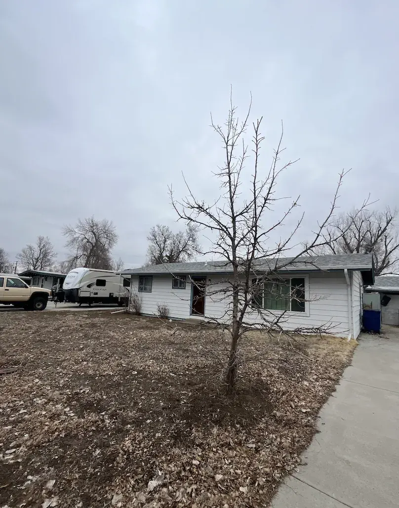 Front Exterior of a Wheat Ridge, Colorado house bought as-is by Windcrest Investments, before